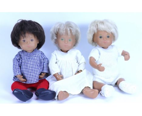 Three Sasha Trendon Ltd Baby dolls, two blonde haired babies one with light green eye painting, and darker haired baby in che