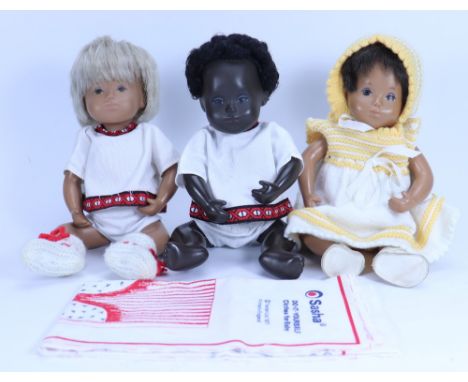 Three Sasha Trendon Ltd Baby dolls, blonde, dark haired and black baby with short black hair, (condition: good), together wit