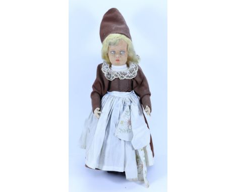 A Lenci ‘Lake Garda’ cloth doll, Italian circa 1925, the moulded felt head with painted blue side glancing eyes, shaded mouth