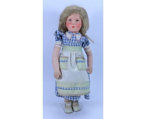 A Kathe Kruse cloth doll, VIII ‘German Child’ German circa 1929, the moulded hollow head with painted features, light brown s