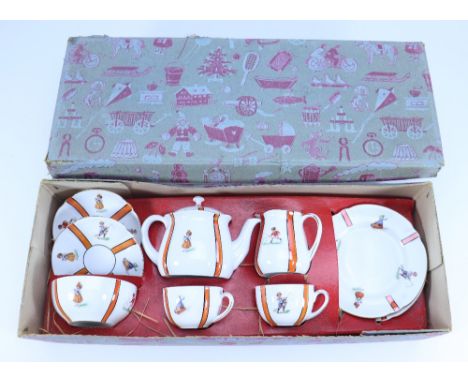 Two Child’s boxed Tea Services for two, in original card box with toy decoration the service with orange lined decoration and