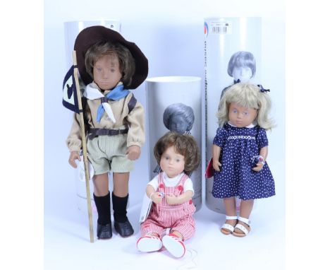 Three Sasha Gotz dolls in tubed boxes, circa 2000, including Michel in Scouting outfit with pennant and satchel, Esther in na