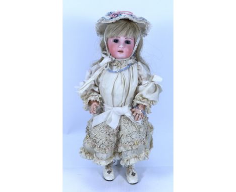 A rare Heubach for SFBJ 1907 bisque head doll, German, circa 1905, with fixed blue glass paper-weight eyes, painted lashes an