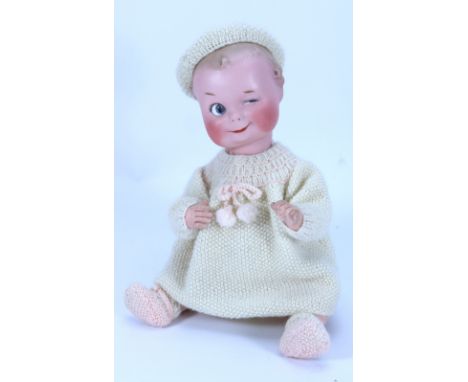 A rare Gebruder Heubach 9141 ‘Winker’ bisque head character doll, German, circa 1920, the good quality bisque head winking ch