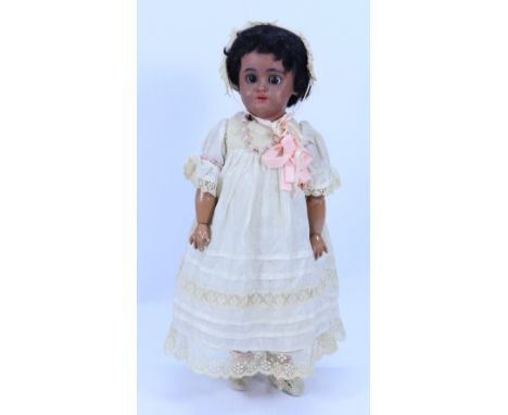 A Simon & Halbig 1078 black bisque head doll, German circa 1910, with weighted brown glass eyes, painted lashes and brows, op