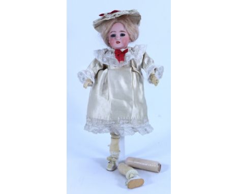 A Simon & Halbig 1249 all original bisque head doll, German, circa 1910, with weighted blue glass eyes, painted lashes and fe