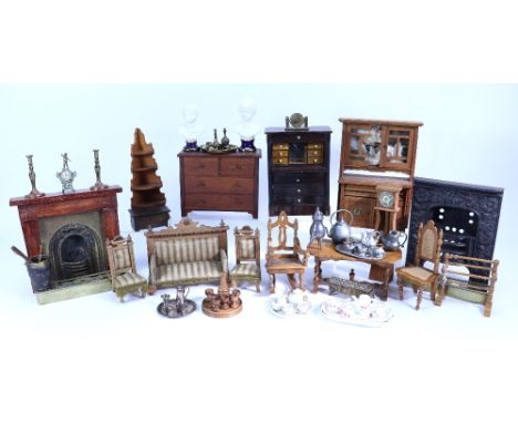 A collection of dolls house furniture and miniatures, including cast iron fireplace with foliage decoration, 7 ¼” (18.5 cm) h