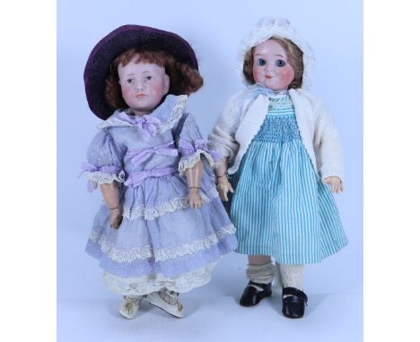 A Kammer & Reinhardt 114 bisque head character doll, German circa 1910, with painted brown eyes, single stroke brows, closed 