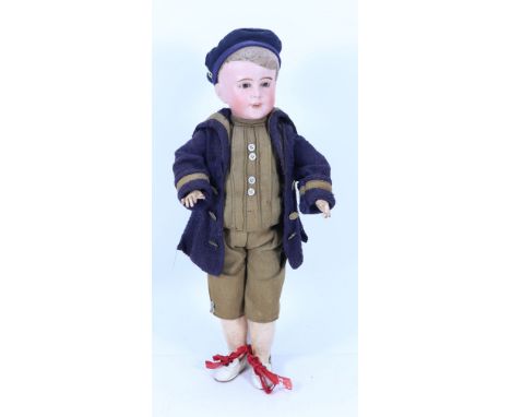 An S.F.B.J 237 bisque head character doll in original clothes, French circa 1910, with fixed blue glass eyes, painted lashes 