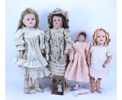 A collection of dolls for repair/restoration, including a large English bisque shoulder head doll, with weighted blue eyes, o