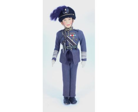 A King George VI Alpha Farnell cloth doll in RAF uniform, English circa 1937, the moulded felt head with nicely painted blue 