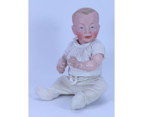 A Kammer & Reinhardt 100 ‘Kaiser’ bisque head character baby doll, German circa 1909, with painted blue eyes, single stroke b