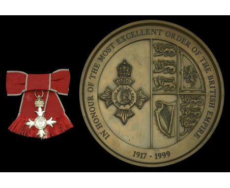 The M.B.E. attributed to Mrs. W. Jean Bavin, Founder Chairman of the North Lancashire Victim Support Scheme  The Most Excelle
