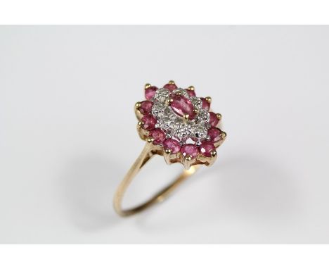 9ct gold ruby and diamond ring, set with a central marquise-cut ruby approx 5 x 2mm, size P approx 5 x 2mm, approx 4 pts of e
