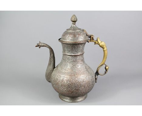A 19th century Islamic ewer, tinned copper, Kashmir, approx 35 cms.&nbsp;Condition for this Lot - Sale 06/05/2020Lot 155 - pe