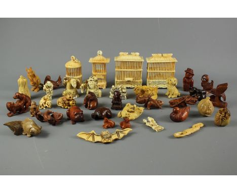 20th century resin and carved wood netsuke and miniature carvings, comprising goldfish, horses, dogs, rabbit, turtle, mushroo