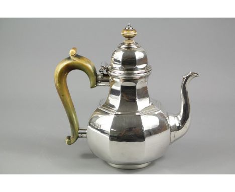 Asprey Britannia standard silver teapot of segmented octagonal baluster form with fruitwood handle and finial, London hallmar