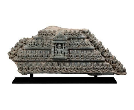 A CARVED BLACK STONE RELIEF DEPICTING THE COSMIC VISHNU, RAJASTHAN OR GUJARAT, CIRCA 11TH CENTURY from a torana, the central 