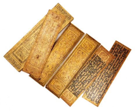 A GILT-LACQUER MANUSCRIPT IN BOX (KAMAWA-SA), BURMA (MYANMAR), 20TH CENTURY the fourteen folios inscribed with applied brown 