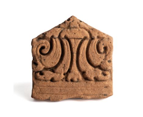 A TERRACOTTA ARCHITECTURAL ELEMENT, JAVA, INDONESIA, CIRCA 10TH CENTURY with scrolling foliate design, carved in relief, toge