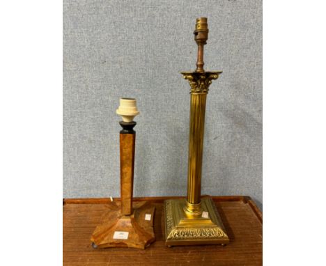 A brass Corinthiam colum lamp and an Art Deco walnut lamp 
