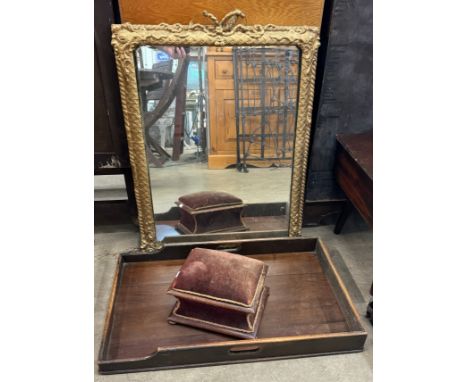 A gilt framed mirror, a tray and a stool