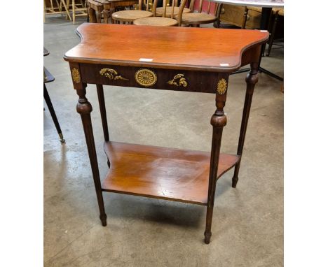 A small French mahogany and parcel gilt console table 