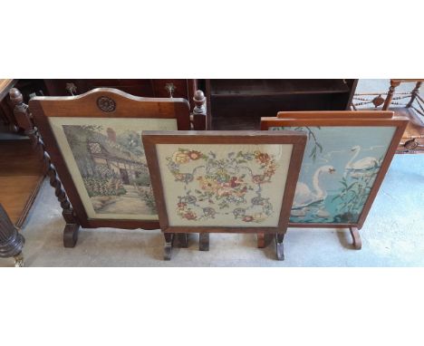 Two tapestry fire screens and a tapestry tilt top table