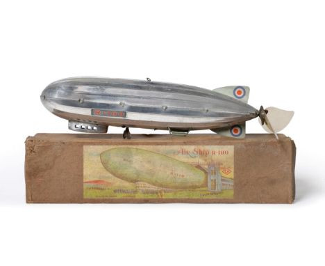 CK (Japan) Air Ship R-100 clockwork, silvered finish with two celluloid propellers, RAF roundels to tail and lithographed 'R-