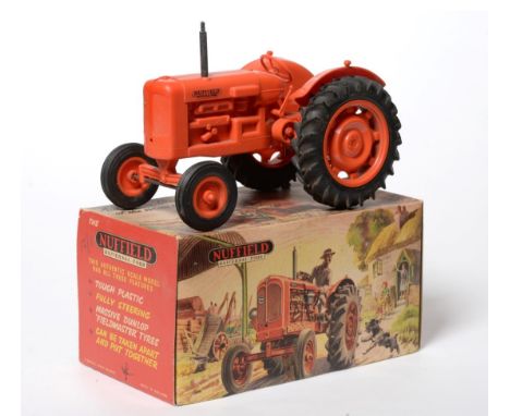 Raphael Lipkin Nuffield Universal Four Tractor red plastic, with instruction sheet (G-E box G, with card inserts)