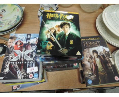 The complete set of Harry Potter DVDs, The X Men and The Hobbit DVDs