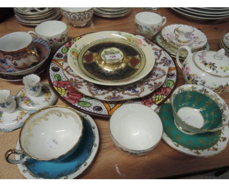 A selection of ceramics including Aynsley Cabinet cups and saucers, Three Wedgwood cups, Newport pottery Clarice Cliff bowl A