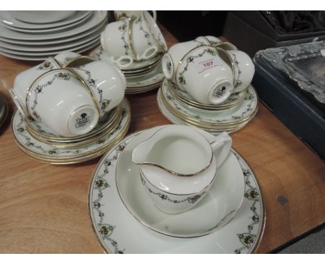 A Windsor part tea service with foliate swag decoration and gilt rims