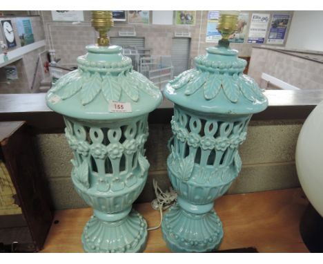 A pair of decorative ceramic table lamps