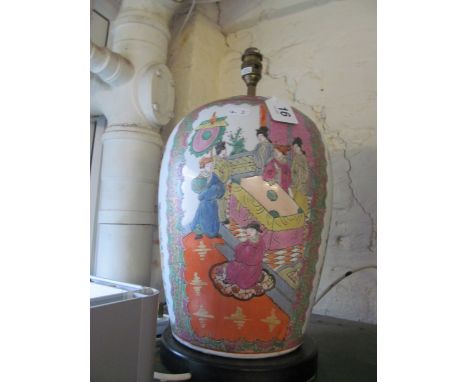 A large oriental table lamp decorated birds and flowers and scenes of geisha some hairline cracks