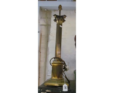 A heavy brass Corinthian column table lamp