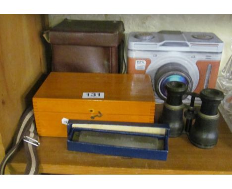 A Kodak Polaroid Camera, pair of Iris binoculars, camera tin, microscope and Hohner harmonica