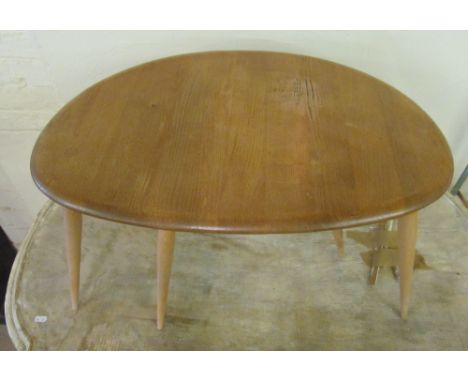 A nest of three Ercol tables slight mark to top