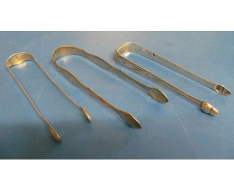 Three Georgian silver tongs 2.7oz