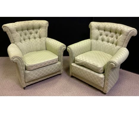 A pair of mid century button-back arm chairs, fan-shaped backs, scroll arms, pale green upholstery, each measuring 77cm tall 
