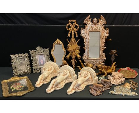 Interior design - three ceramic Cherub wall brackets, an ornate gilt looking glass;  rococo style frames, etc, qty. 