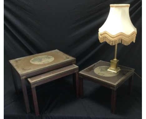 A nest of three tables with global map design, lined with brass; a Corinthian columned lamp with shade (2) 