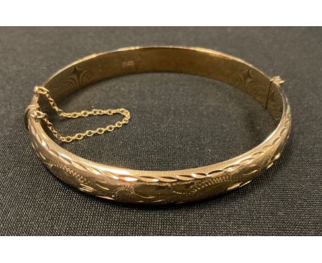 A 9ct gold hinge bangle, 10g 