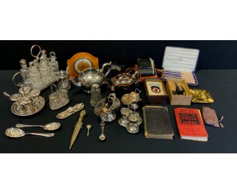 A Victorian cruet stand with loop handle, c.1895; an Edwardian four egg cruet stand, c.1905; A Victorian sugar scuttle, c.189