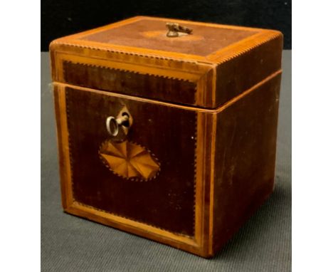 A George III mahogany marquetry inlaid tea caddy, with oval patera panels, ebony and boxwood stringing, 11.5cm high, 11.5cm w