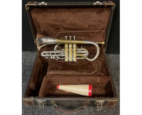 A Vincent Bach Stradivarius model 184 silver plated cornet, Elkhart Industries, USA, ML 204279, mute, cased 