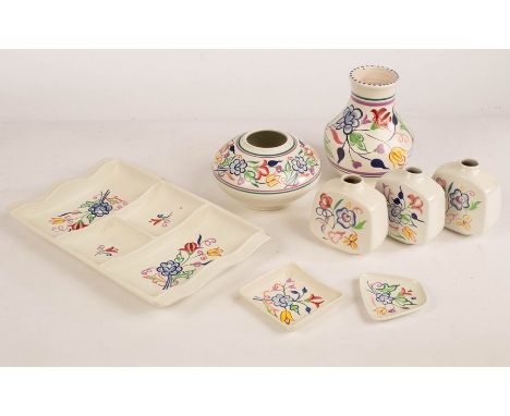 Poole Pottery, a floral four section hors d'oeuvres dish, 34cm wide, three small square floral vases, 11cm high, a floral vas