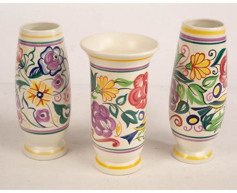 Poole Pottery, three floral vases, the tallest 23.5cm high CONDITION REPORT: Condition information is not usually provided in