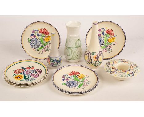 Poole Pottery, eight floral dinner plates, 23cm diameter, a large floral posy dish, 18.5cm diameter, a floral bottle vase, 26