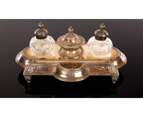 A Victorian silver inkstand and pen tray, James Davis & Son, Sheffield 1894, with rounded sides and beaded borders, fitted tw